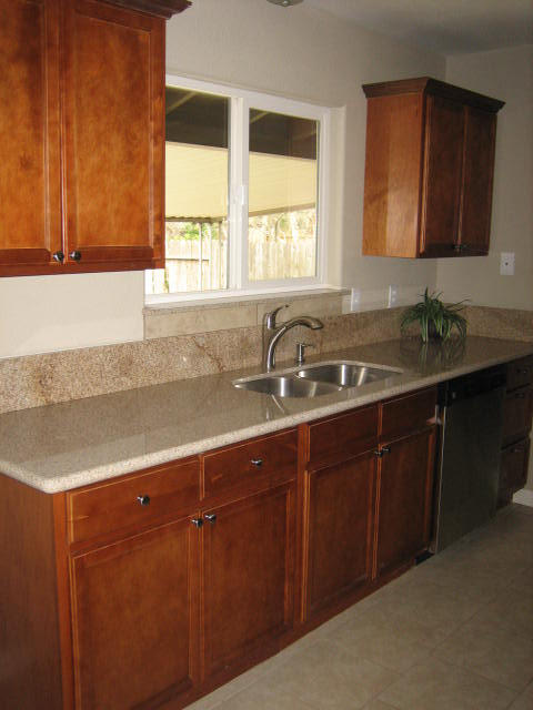 2610 Irwin Road Redding, CA 96002 - Photo 11 of 27 a kitchen with a sink and a window