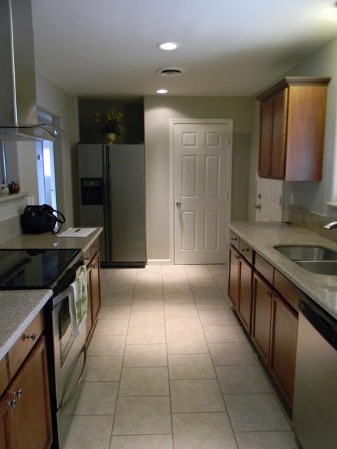 2610 Irwin Road Redding, CA 96002 - Photo 14 of 27 a kitchen with stainless steel appliances granite countertop a sink and a stove