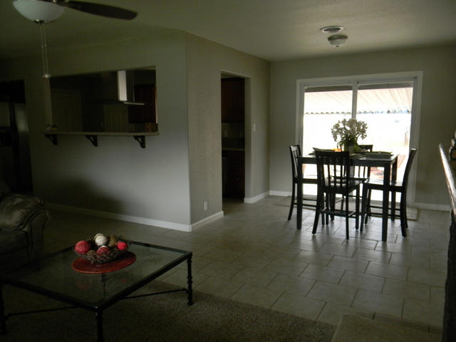2610 Irwin Road Redding, CA 96002 - Photo 3 of 27 a living room with furniture and a window