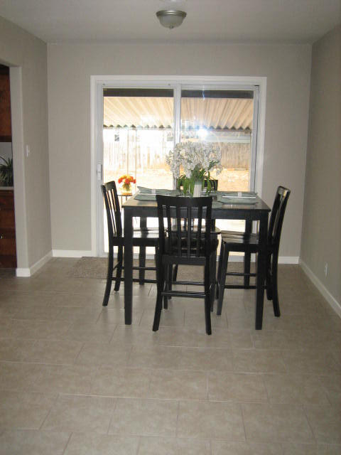 2610 Irwin Road Redding, CA 96002 - Photo 4 of 27 a view of a dining room with furniture window and outside view