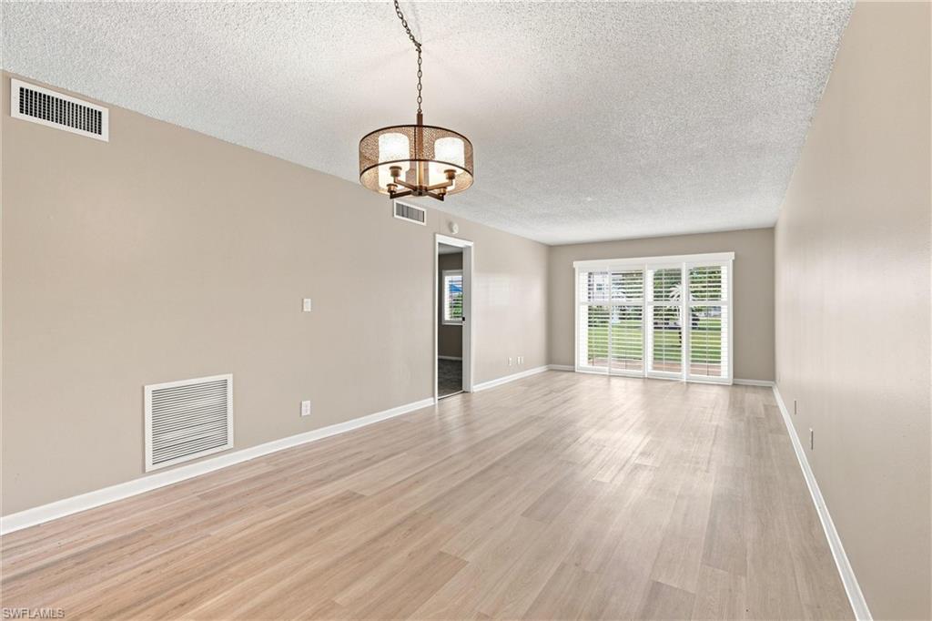 1000 Manatee Road, Unit A102 Naples, FL 34114 - Photo 4 of 28 Dining & Living Room