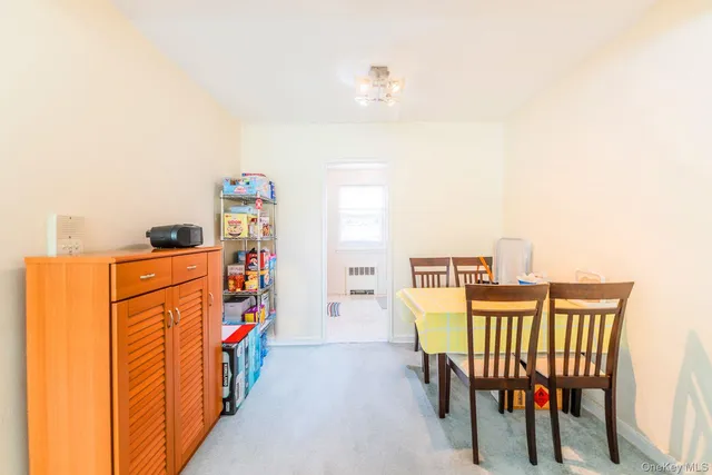 a view of a balcony with furniture