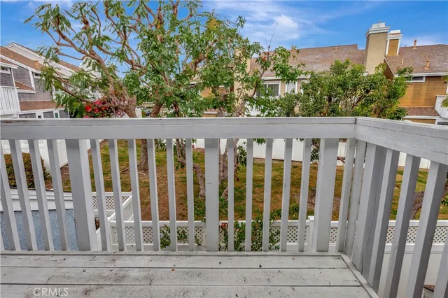 a view of a small yard from a balcony