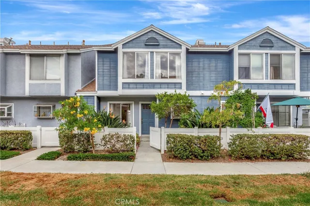 a sign that is in front of flowers