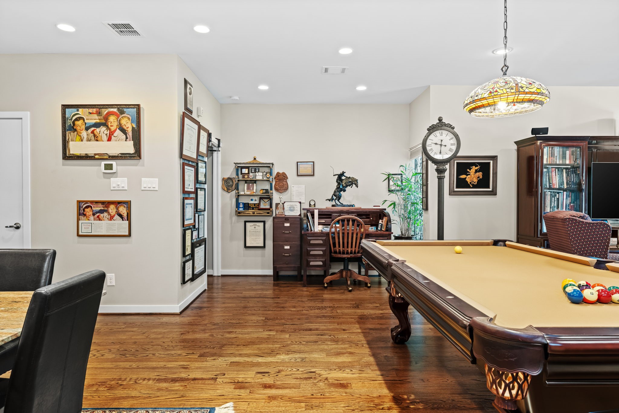 1820 Palm Street Houston, TX 77004 - Photo 25 of 47 a living room with dining room and wooden floor