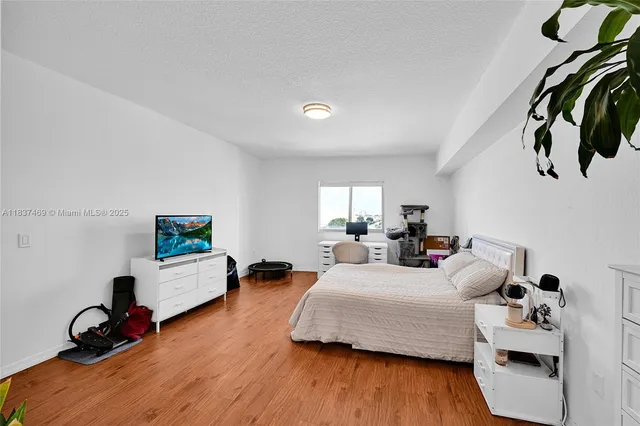 a bathroom with a double vanity sink mirror and toilet