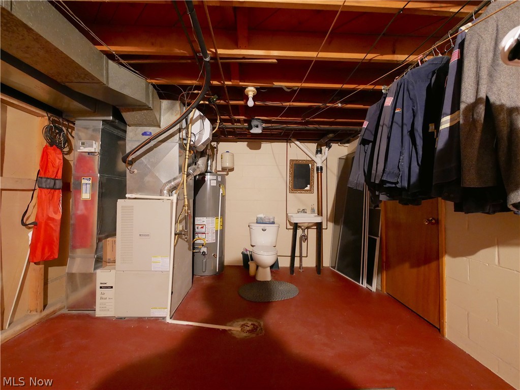 173 Patterson Road Weirton, WV 26062 - Photo 27 of 31 Basement with water heater and heating utilities