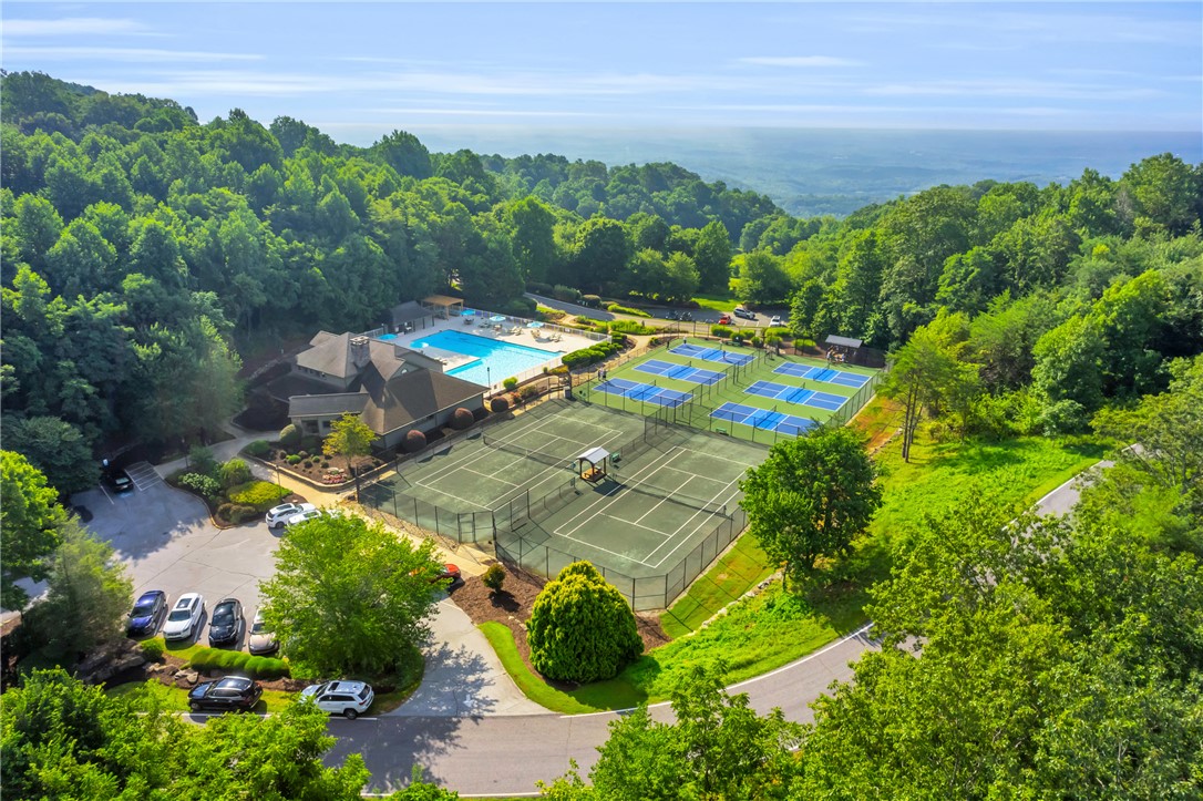 116 Witch Hazel Trail Landrum, SC 29356 - Photo 21 of 26 This scenic mountain retreat boasts exceptional amenities, including tennis courts and a refreshing pool.