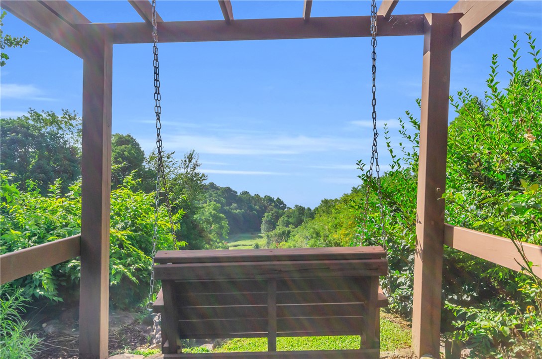 116 Witch Hazel Trail Landrum, SC 29356 - Photo 26 of 26 Enjoy tranquil moments and panoramic views from this inviting outdoor swing.