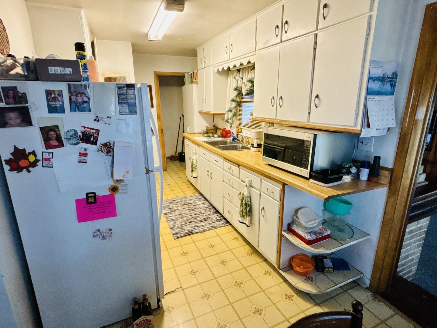 1001 Marcy Street Ottawa, IL 61350 - Photo 7 of 18 a kitchen with stainless steel appliances granite countertop a refrigerator a stove and a sink