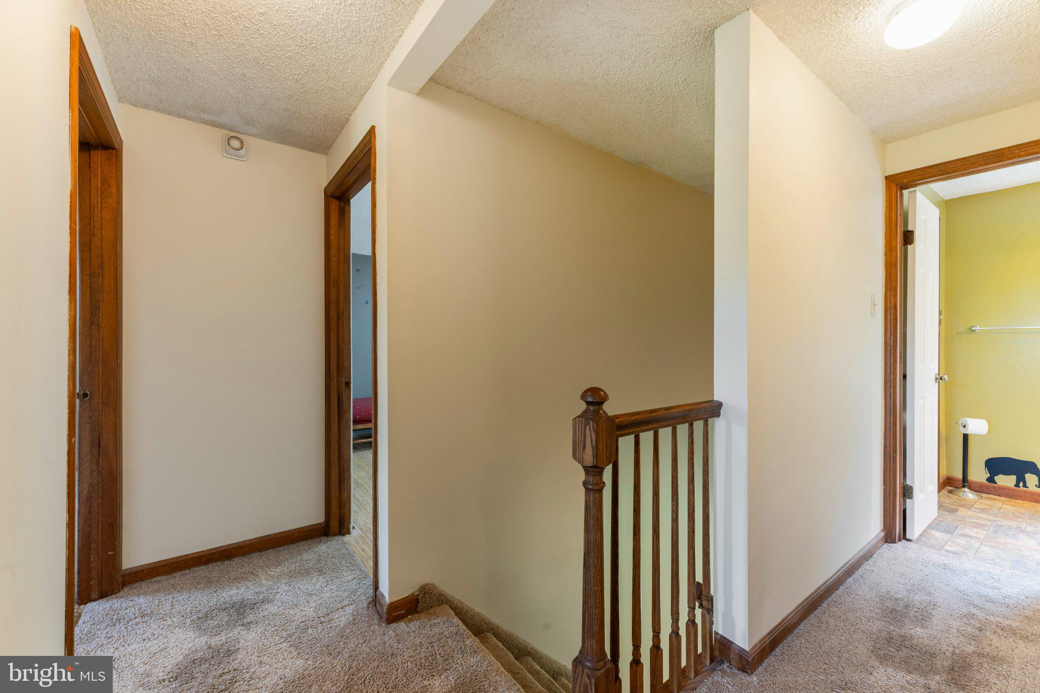 607 Chesterfield Arneytown Road Chesterfield, NJ 08515 - Photo 29 of 57 Inviting hallway with warm tones.