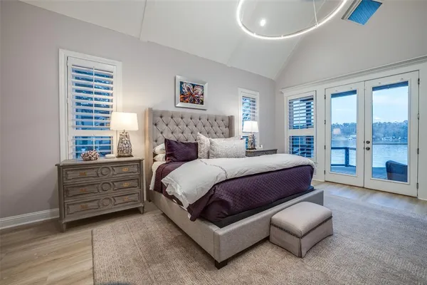 a bedroom with a bed and walk in closet