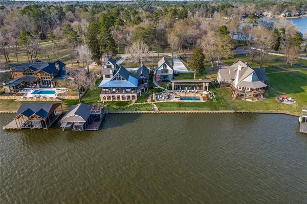 an aerial view of a house with a ocean view