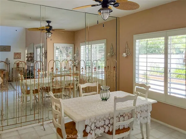 a kitchen with a refrigerator sink stove and cabinets