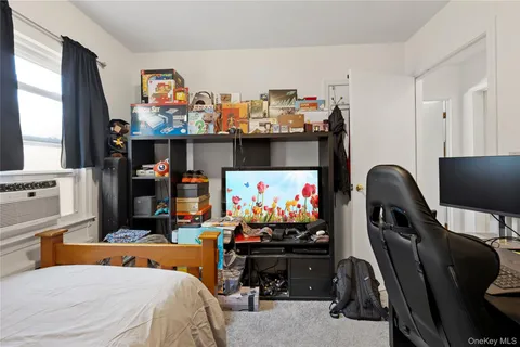 a bedroom with furniture and a bed