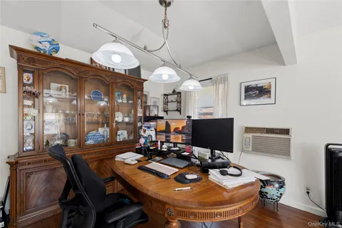 a view of a dining room with furniture