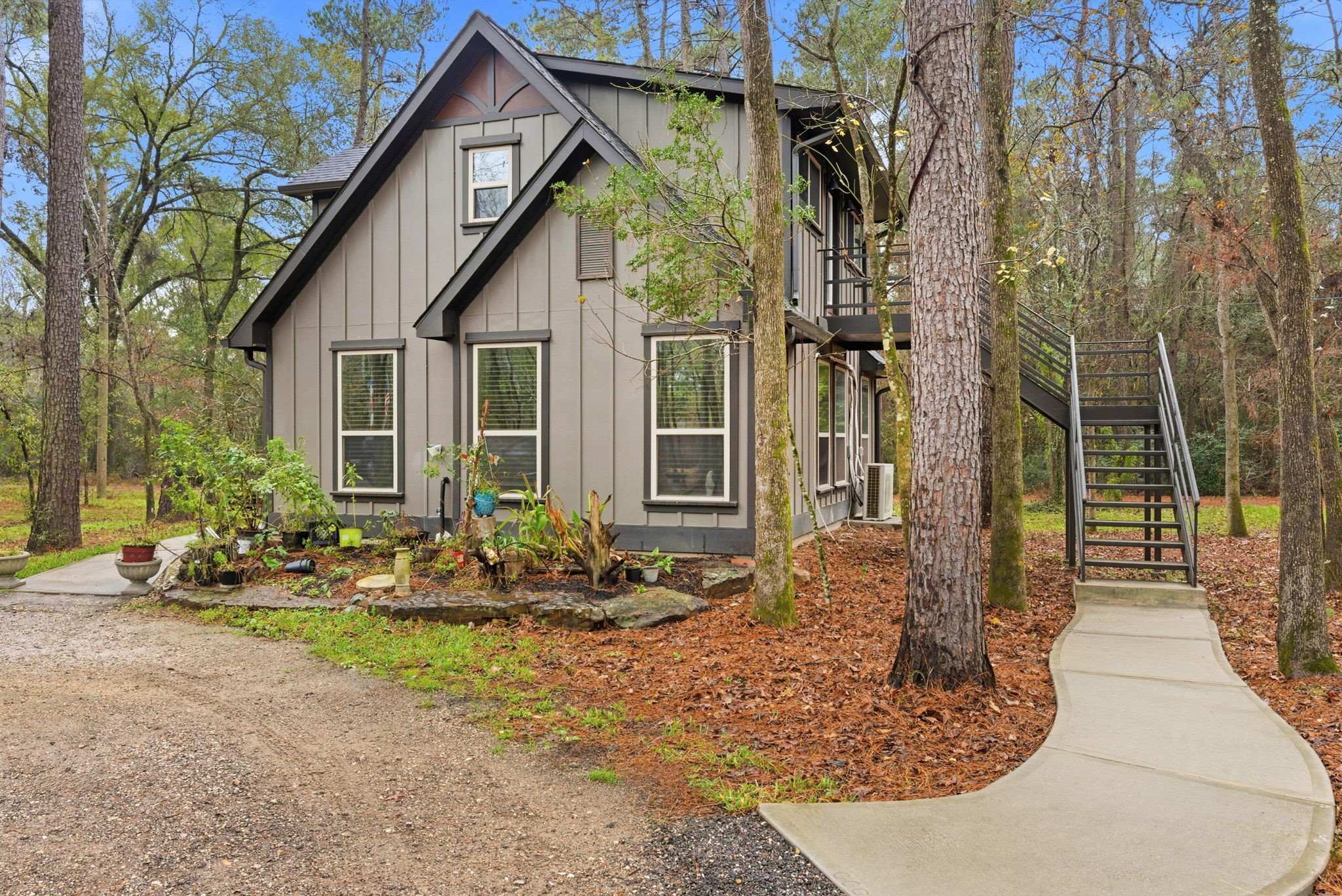 1480 Traylor Road Conroe, TX 77304 - Photo 20 of 25 a front view of a house with sitting area