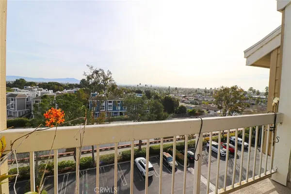 a view of a balcony with mountain view