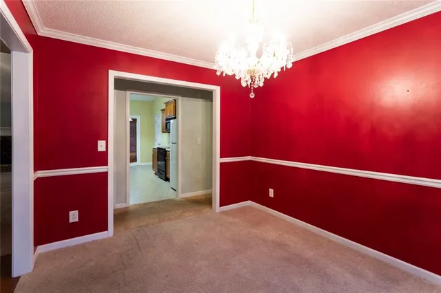 a view of a room with a chandelier