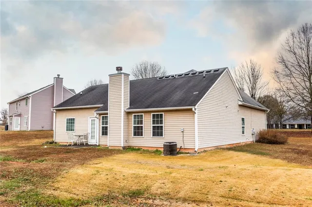 a view of a house with a patio