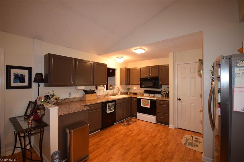 4596 Reid Road Elon, NC 27244 - Photo 5 of 21 Kitchen, appliances remain, pantry