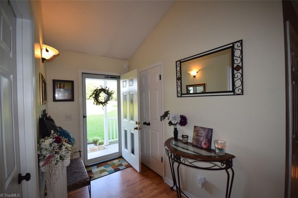 4596 Reid Road Elon, NC 27244 - Photo 9 of 21 Wide and inviting entry with coat closet and office area (door on left in photo)