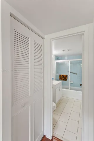 a bathroom with a bathtub and a sink