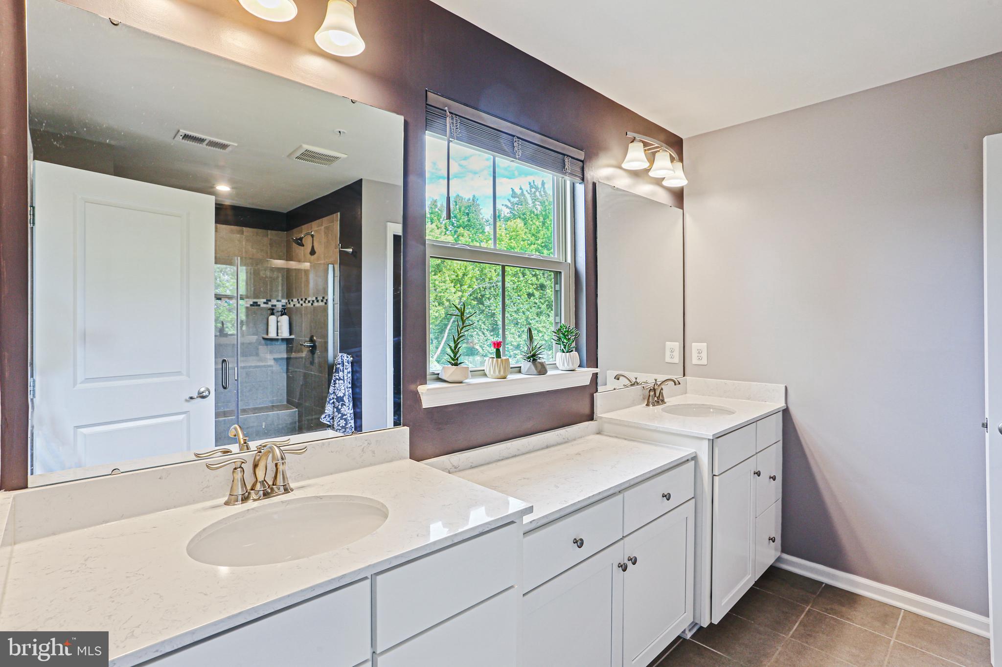 8319 Kippis Road Millersville, MD 21108 - Photo 16 of 49 Primary en suite bathroom with double sinks