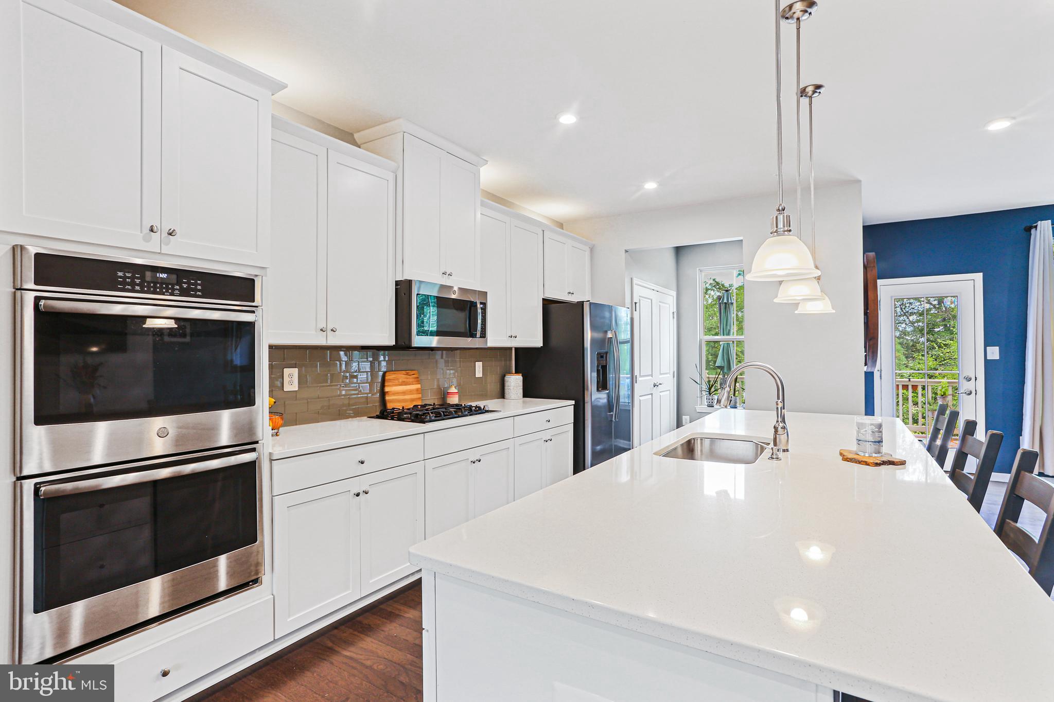 8319 Kippis Road Millersville, MD 21108 - Photo 2 of 49 Gourmet Kitchen with large island, stainless steel