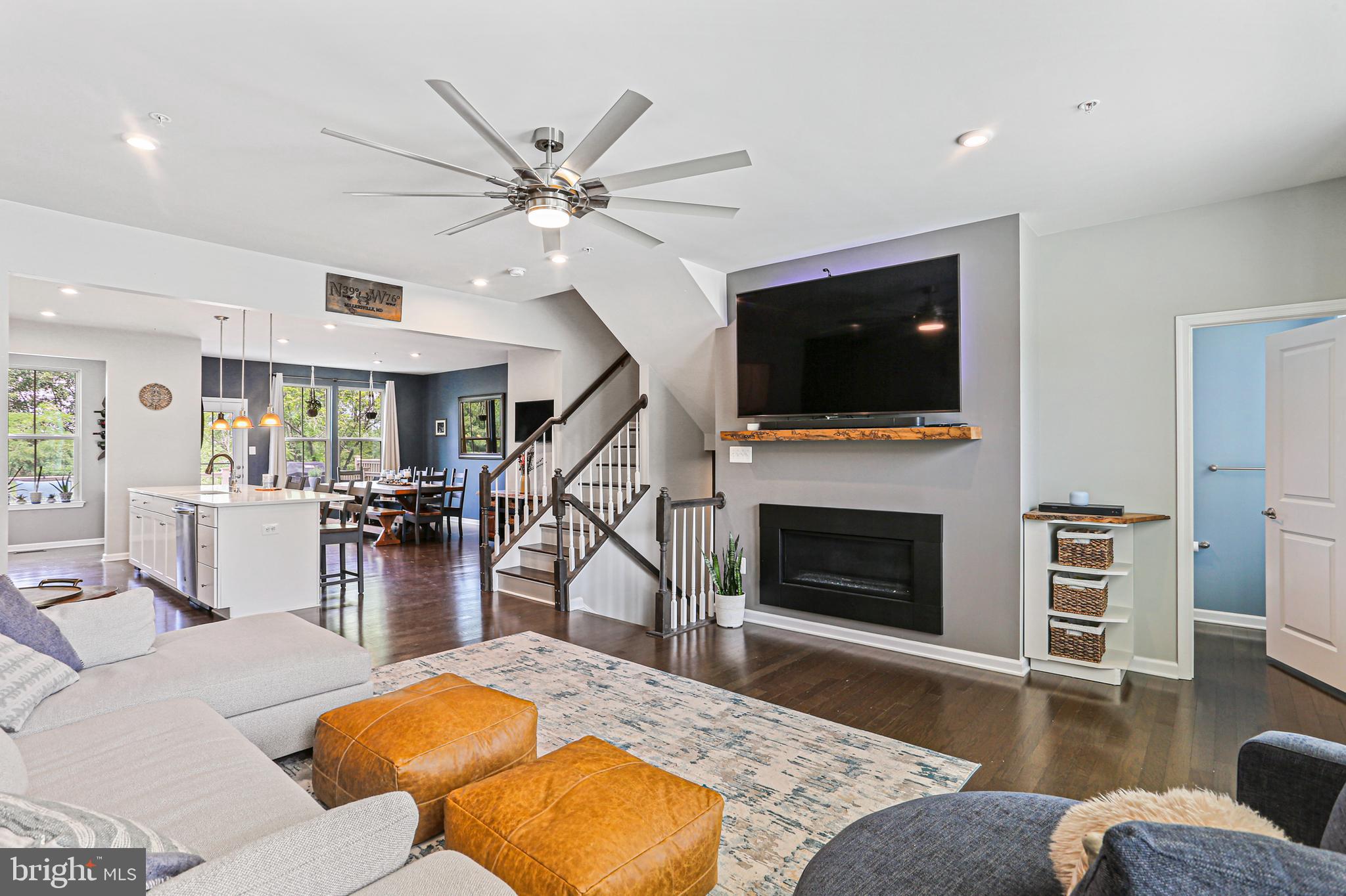 8319 Kippis Road Millersville, MD 21108 - Photo 49 of 49 Open floor plan, living room with fireplace
