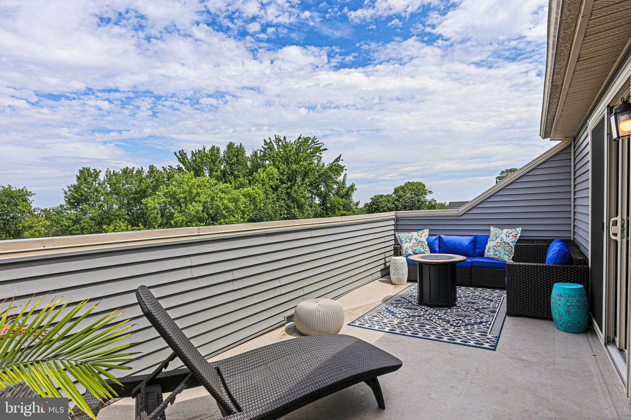 8319 Kippis Road Millersville, MD 21108 - Photo 3 of 49 Rooftop deck off of 4th floor bonus room