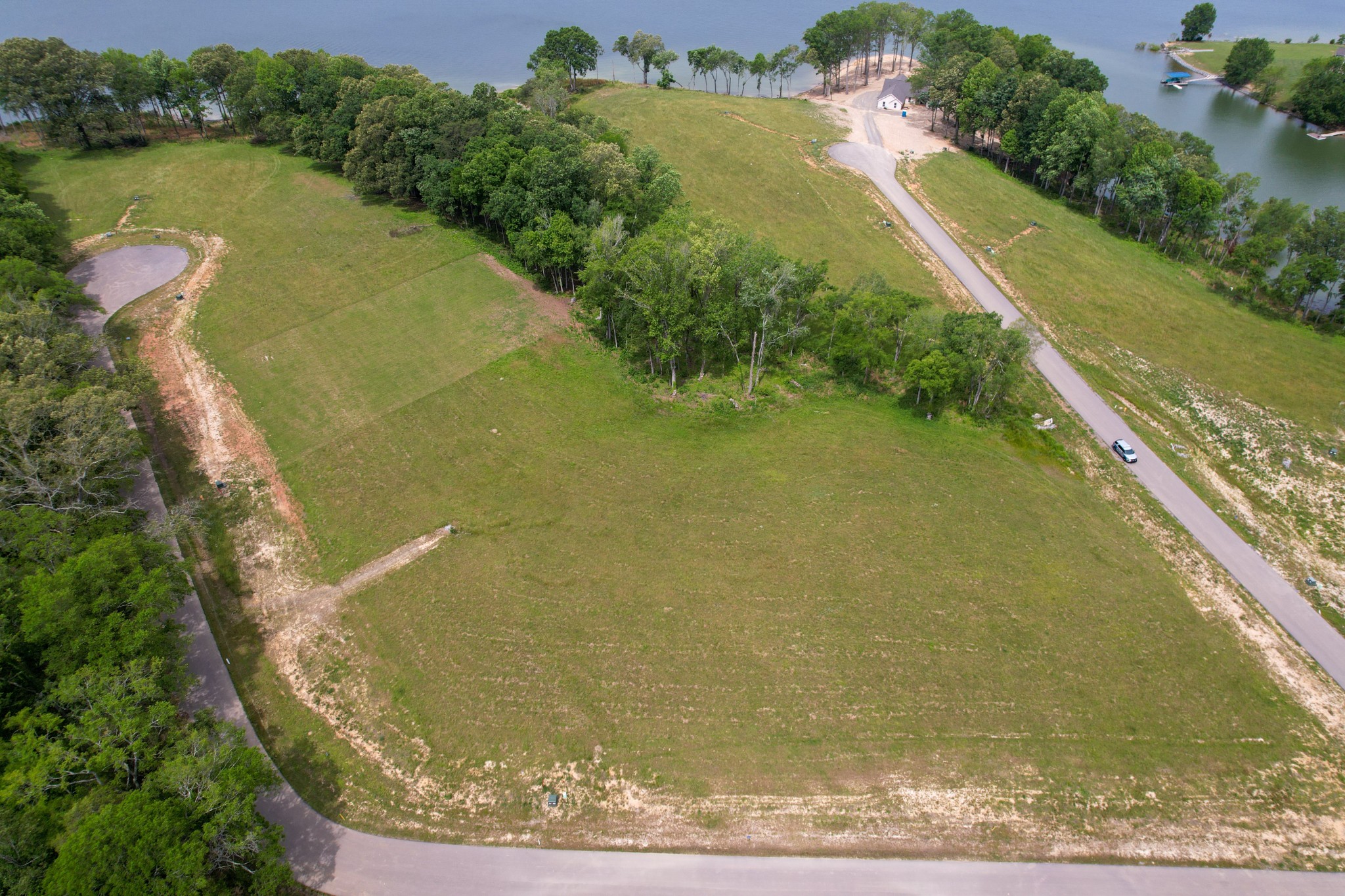 a view of a lake from a yard