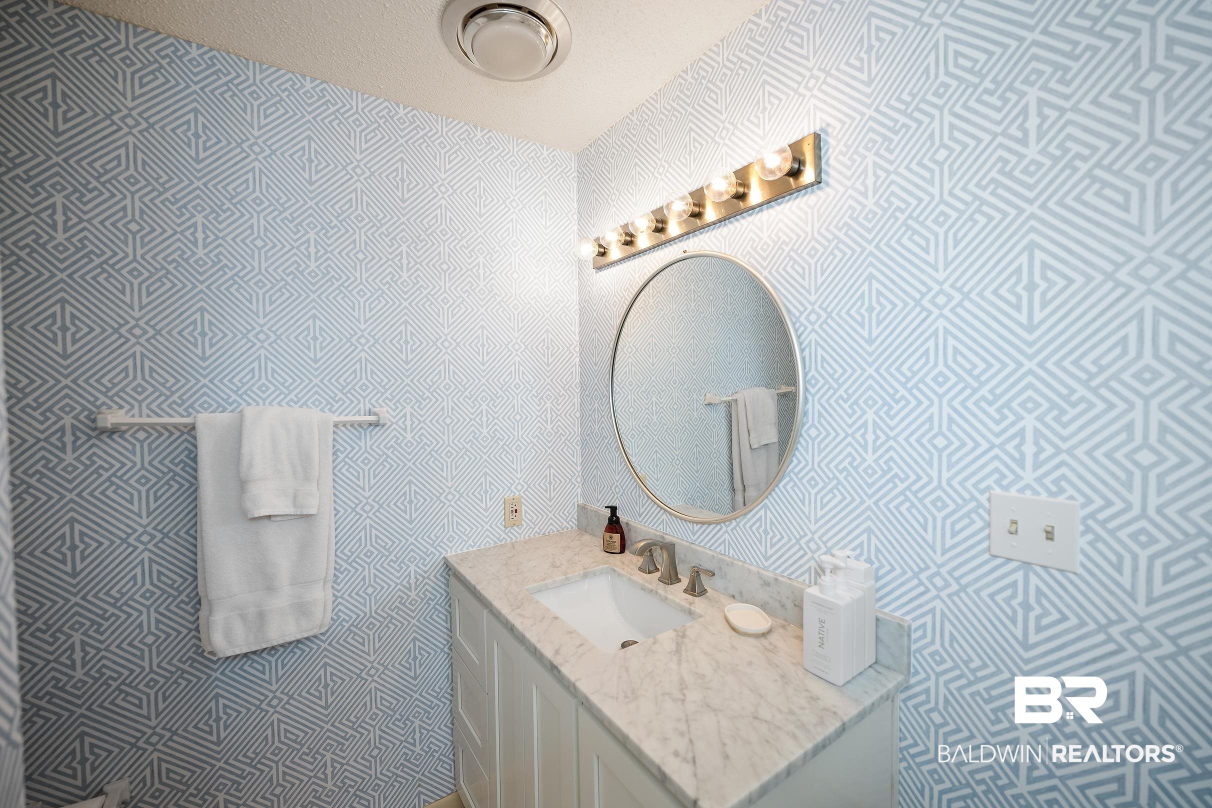 32620 River Road Orange Beach, AL 36561 - Photo 32 of 60 Half bathroom with vanity