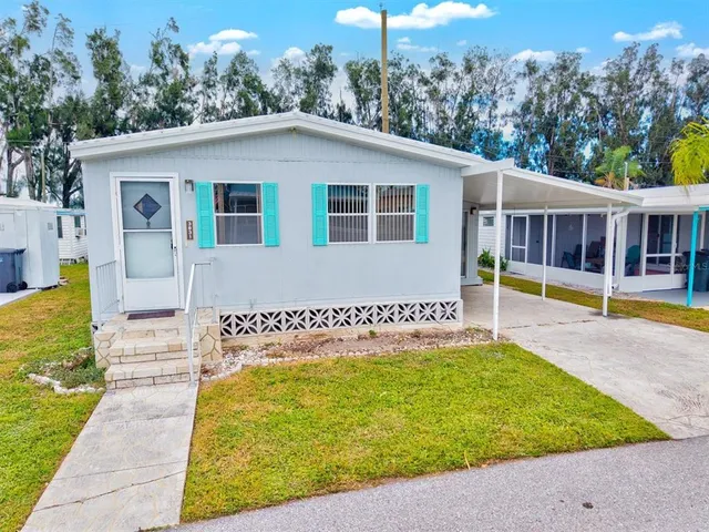 a house with swimming pool in front of it