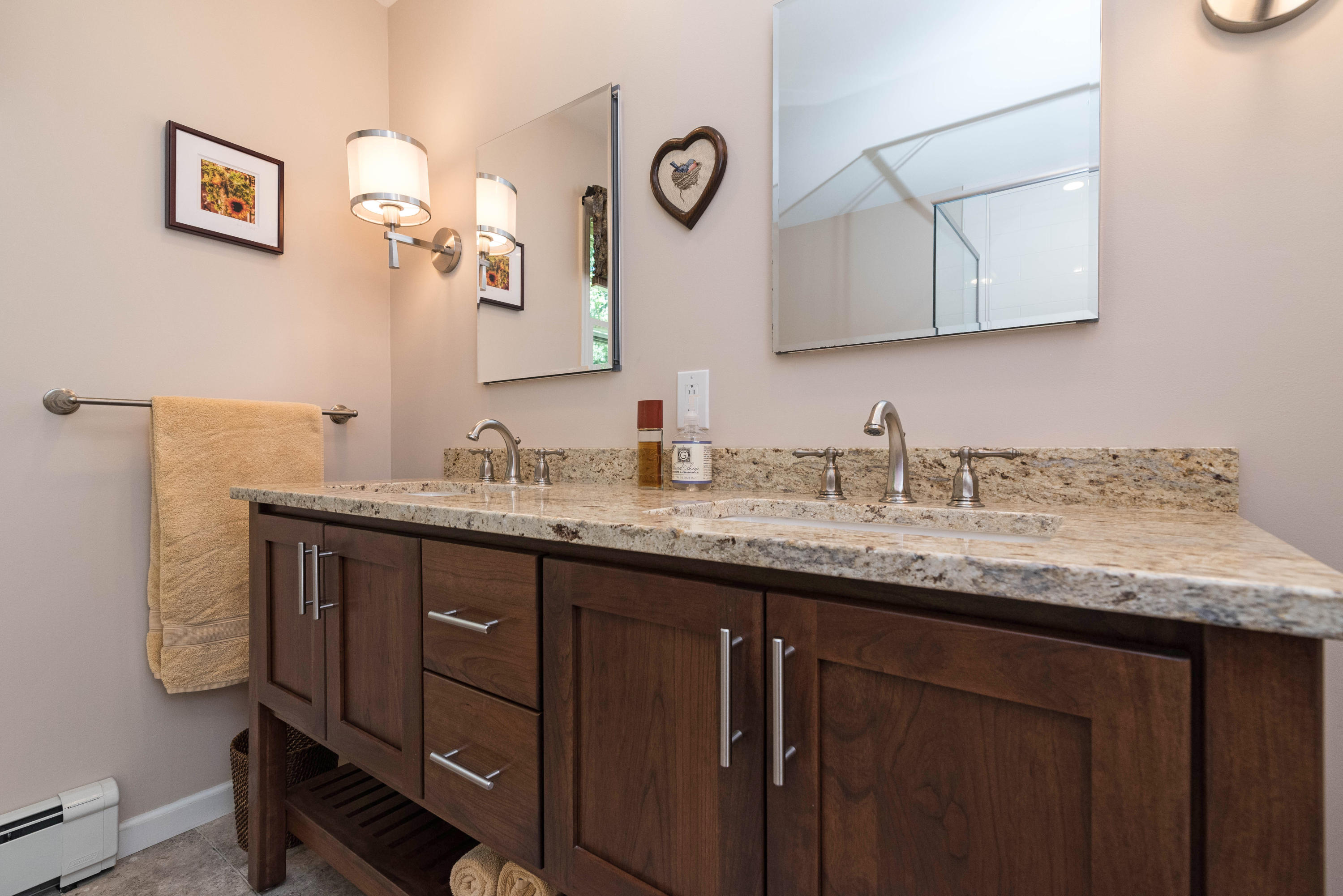 24 Hannahs Road Stamford, CT 06903 - Photo 17 of 28 a bathroom with a granite countertop sink and a mirror