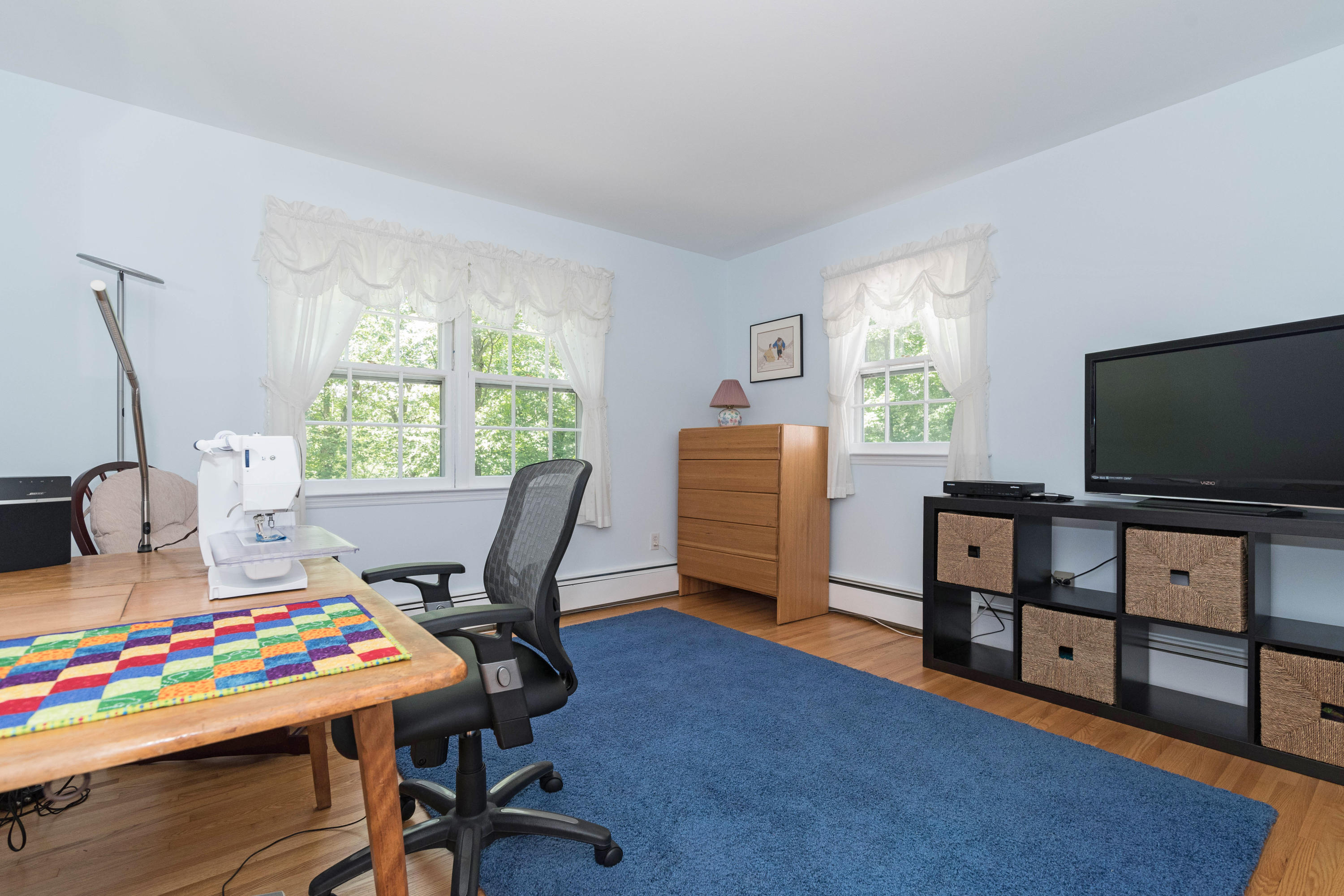 24 Hannahs Road Stamford, CT 06903 - Photo 19 of 28 a living room with furniture and a flat screen tv