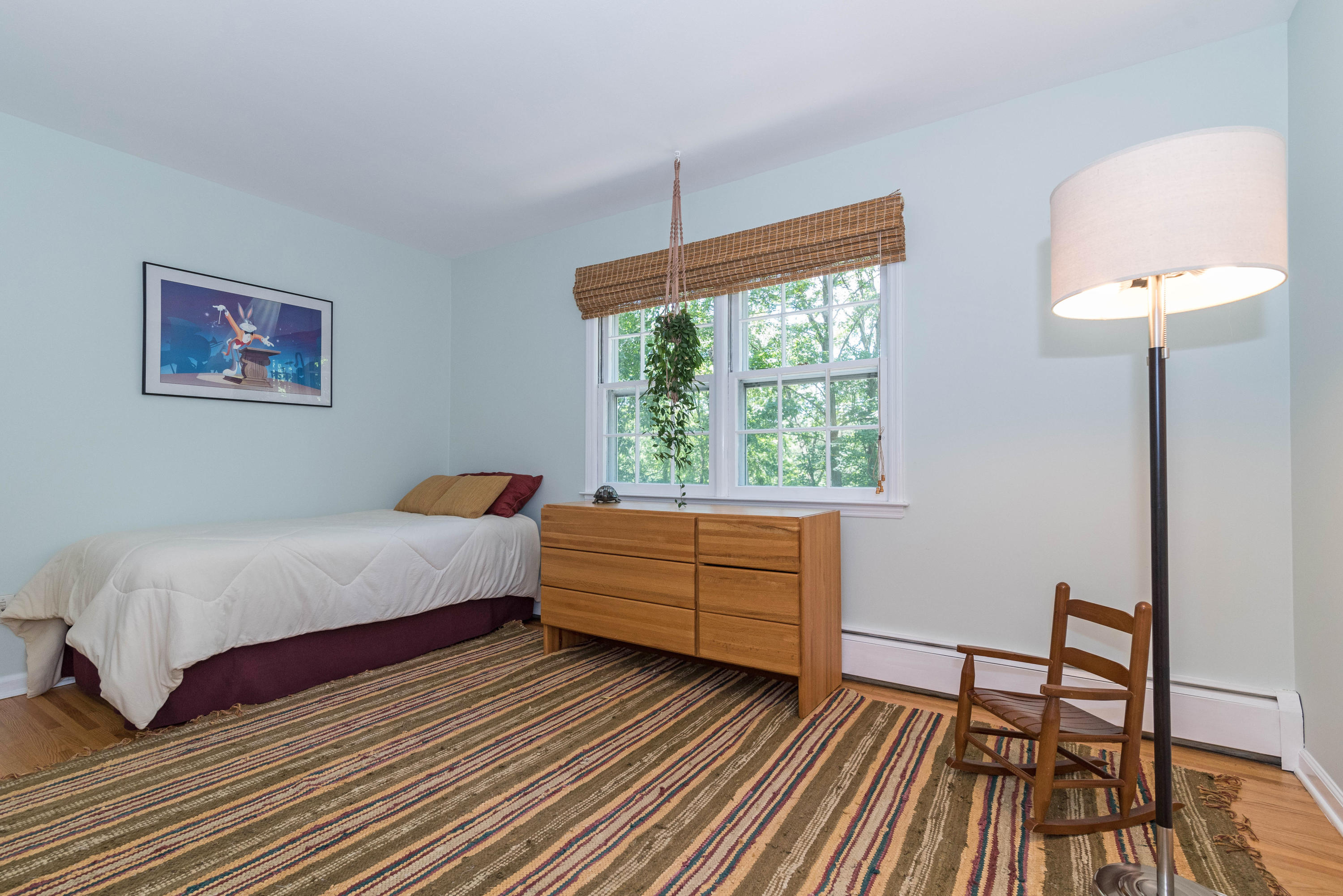 24 Hannahs Road Stamford, CT 06903 - Photo 20 of 28 a bedroom with a bed and a window