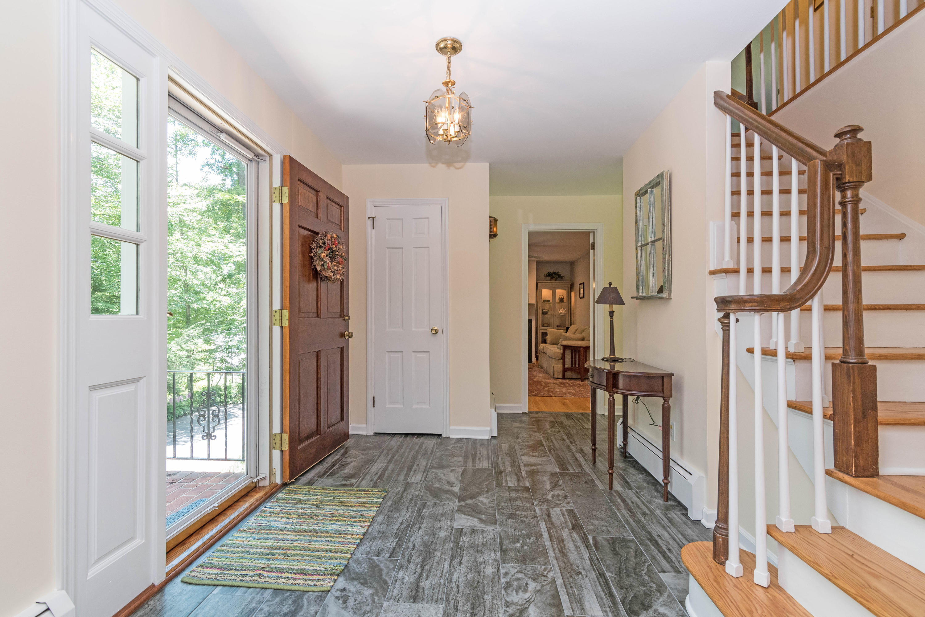 24 Hannahs Road Stamford, CT 06903 - Photo 3 of 28 a view of hallway with wooden floor and windows