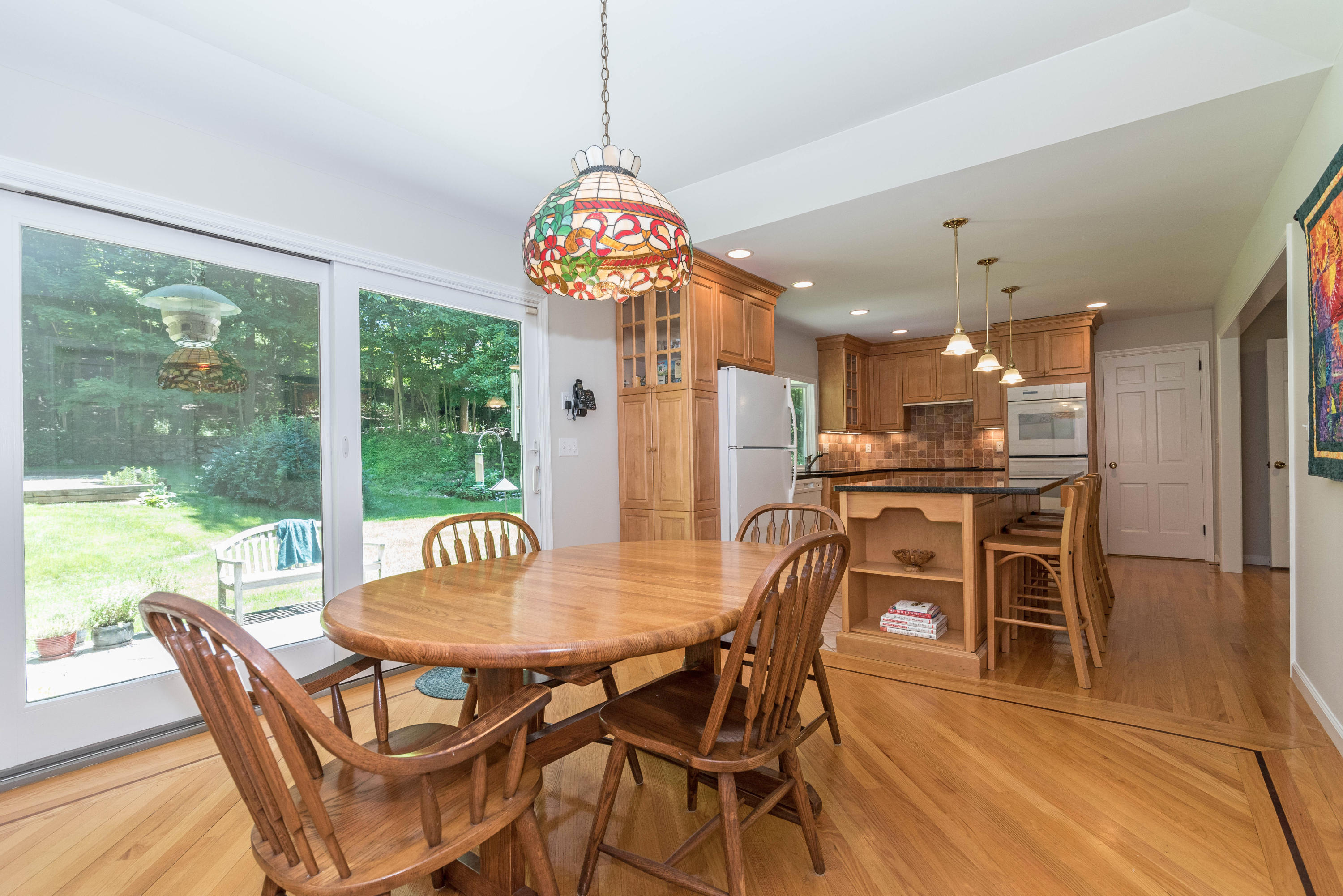 24 Hannahs Road Stamford, CT 06903 - Photo 10 of 28 a view of a dining room with furniture window and outside view
