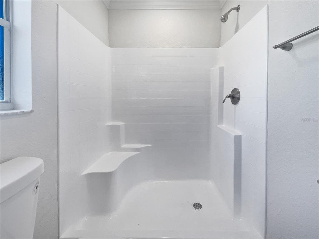 3053 Draper Terrace North Port, FL 34286 - Photo 17 of 31 a close up of a bathtub curtain