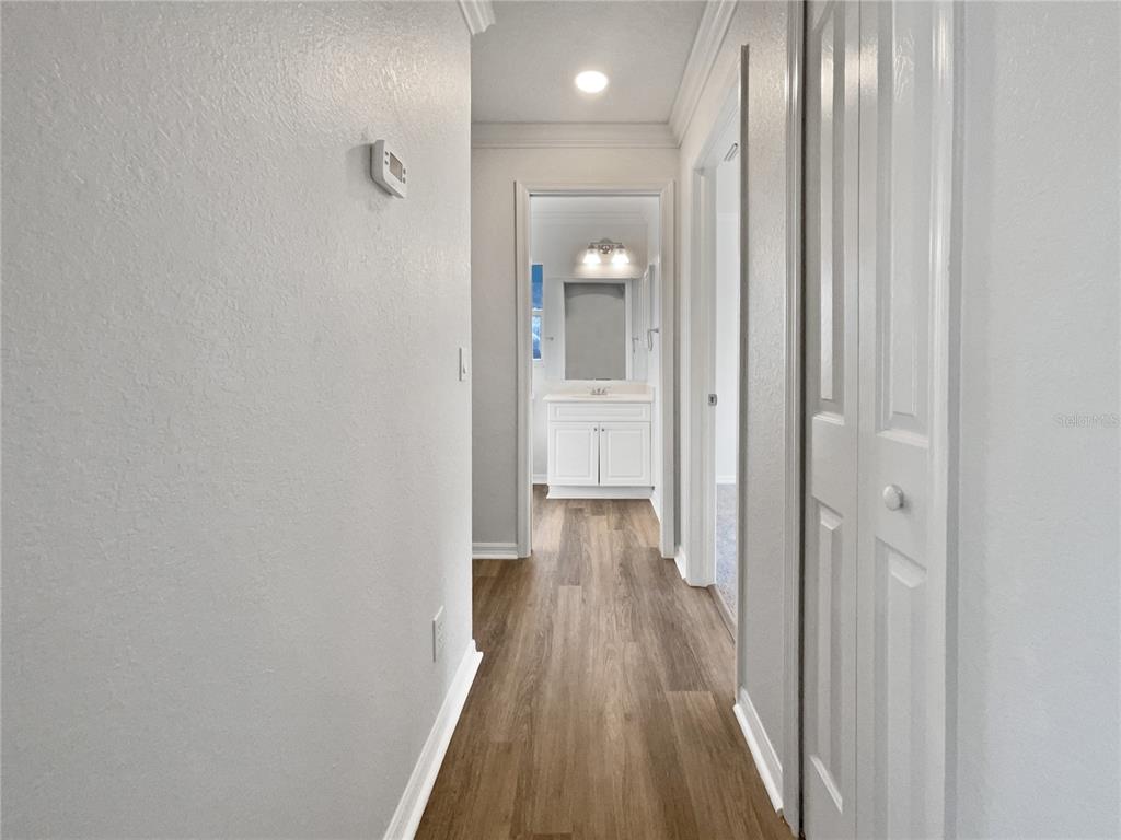 3053 Draper Terrace North Port, FL 34286 - Photo 24 of 31 a view of a room with wooden floor