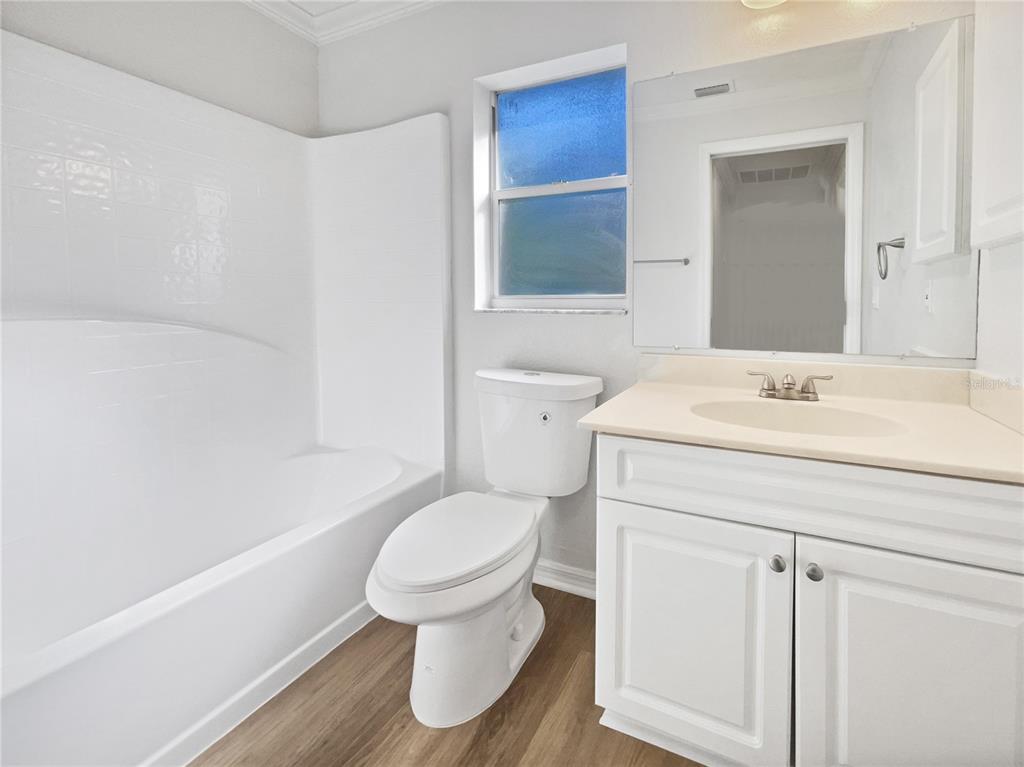 3053 Draper Terrace North Port, FL 34286 - Photo 26 of 31 a bathroom with a sink toilet and shower