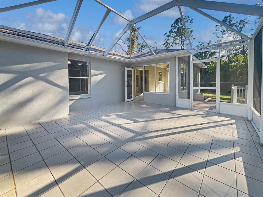 3053 Draper Terrace North Port, FL 34286 - Photo 30 of 31 a view of a hall with windows