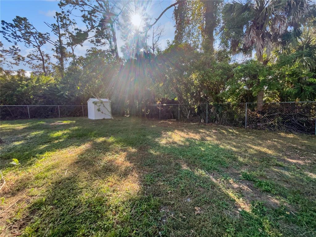 3053 Draper Terrace North Port, FL 34286 - Photo 9 of 31 a view of a big yard