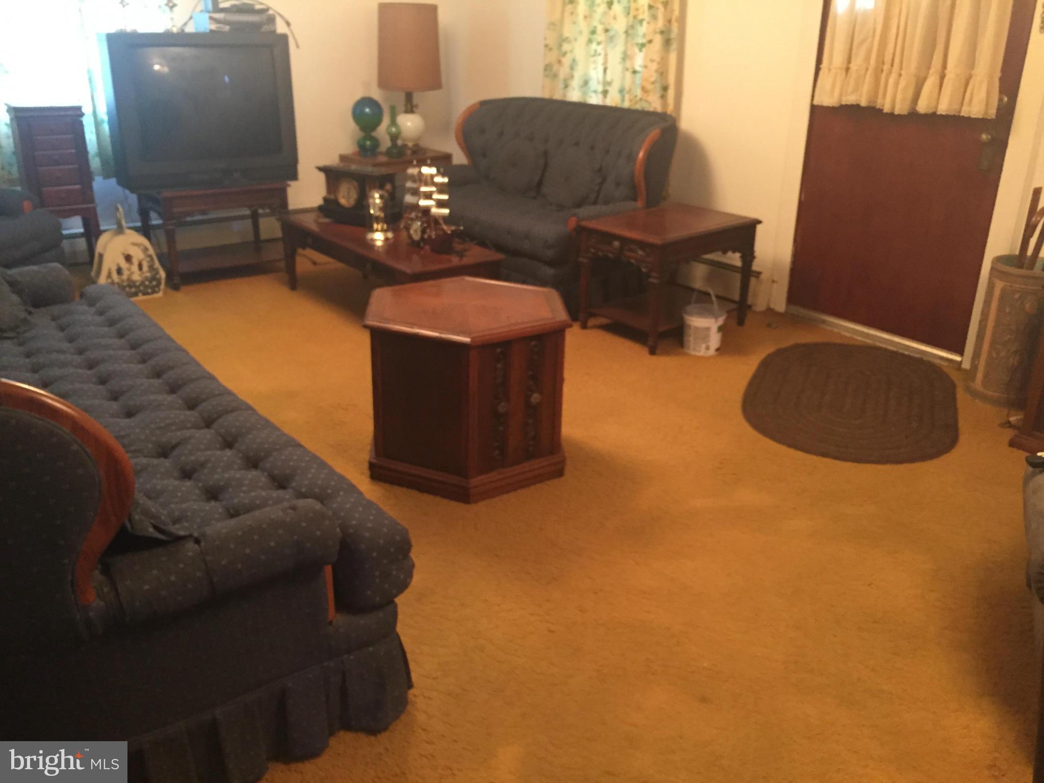 106 North Reymann Street Ranson, WV 25438 - Photo 3 of 17 a living room with furniture and wooden floor
