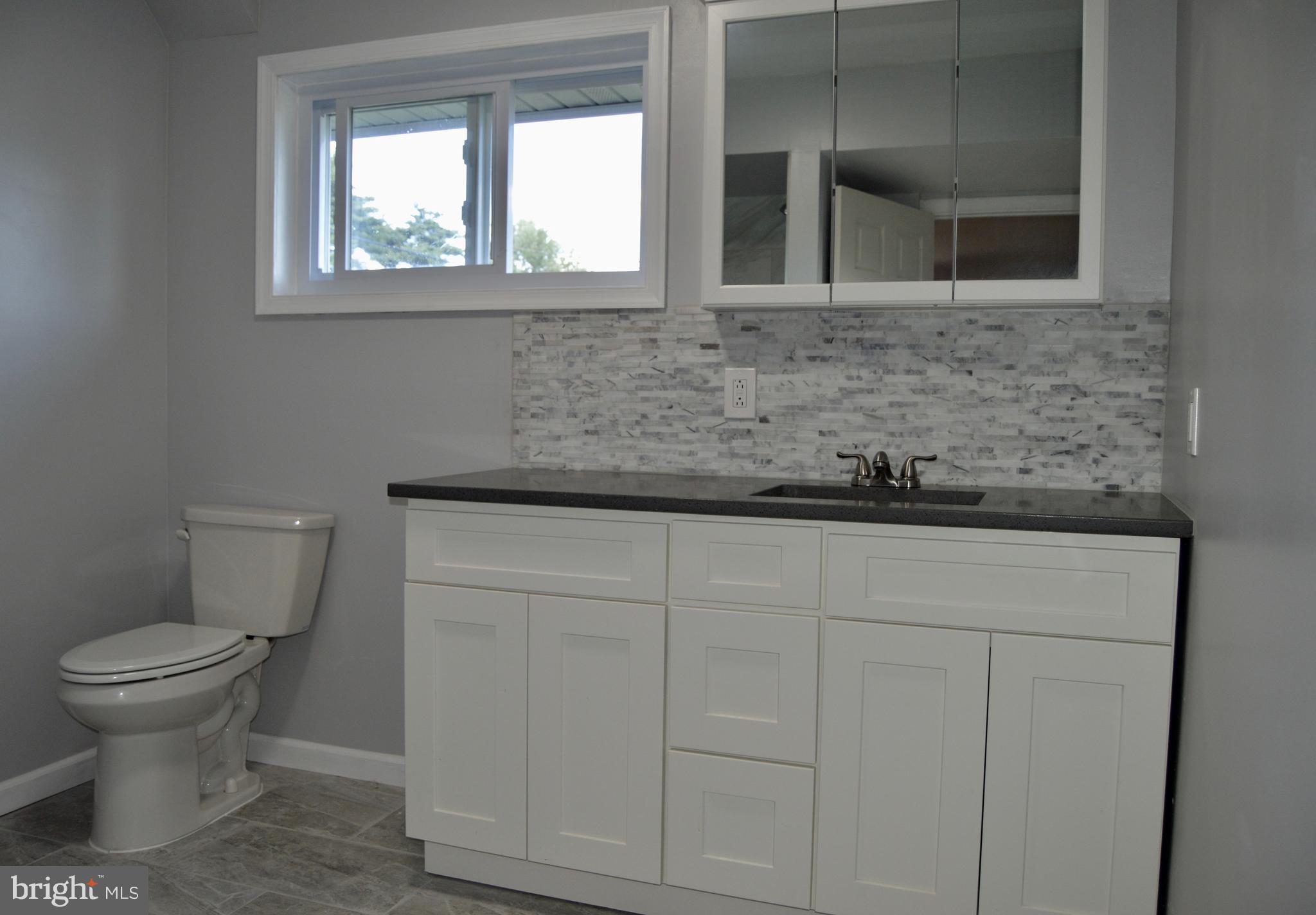 17 Goldengate Road Levittown, PA 19057 - Photo 16 of 40 1st floor bathroom