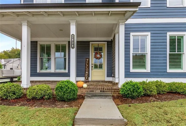 a view of a entryway door front of house