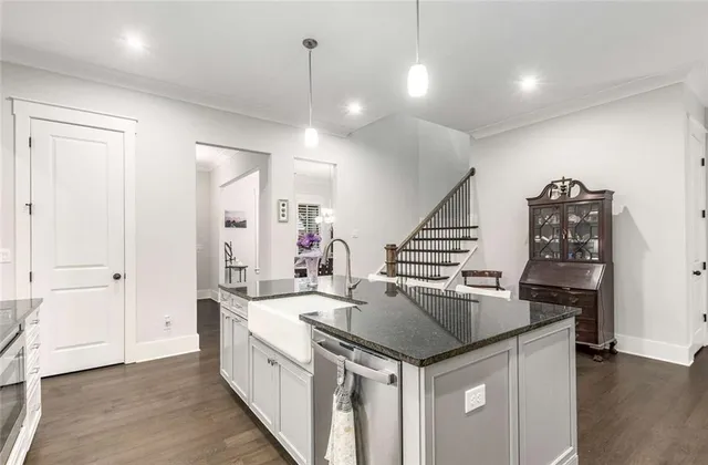 a view of a room with wooden floor and windows