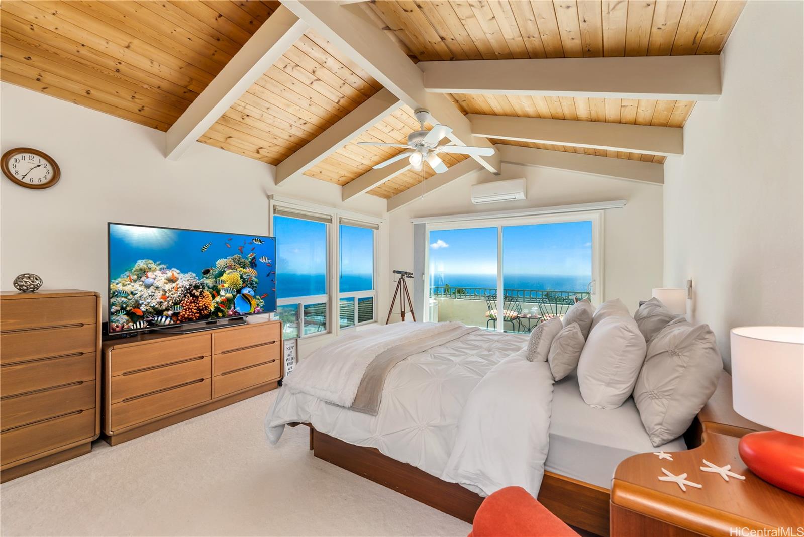 821 Ikena Circle Honolulu, HI 96821 - Photo 1 of 1 a bedroom with furniture and a bed