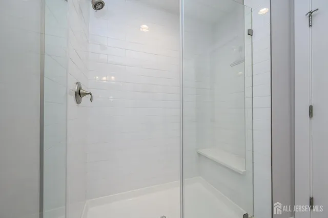 a bedroom with two beds and a couch